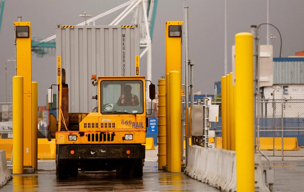 shipping container pulled port vehicle