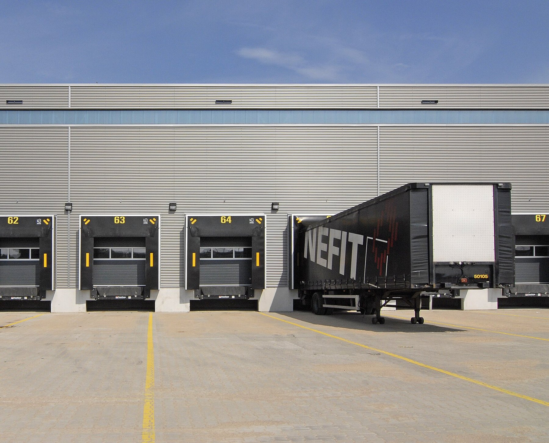 Modern loading bays and delivery trucks